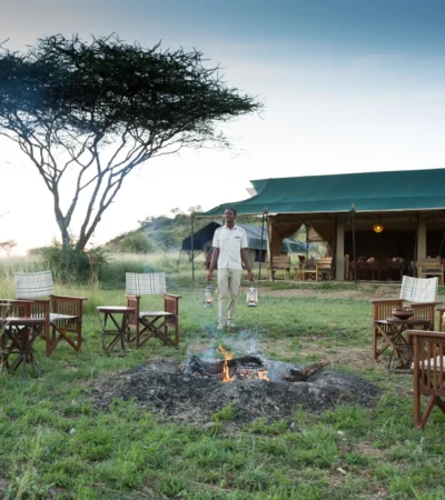 evening camp fire, nyikani camp central serengeti, tanzania