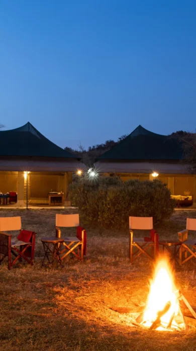 night camp fire, nyikani camp central serengeti, tanzania