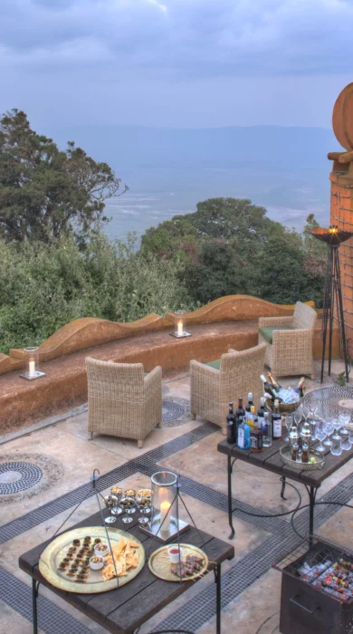 ngorongoro crater lodge guest terrace tanzania yellow zebra safaris