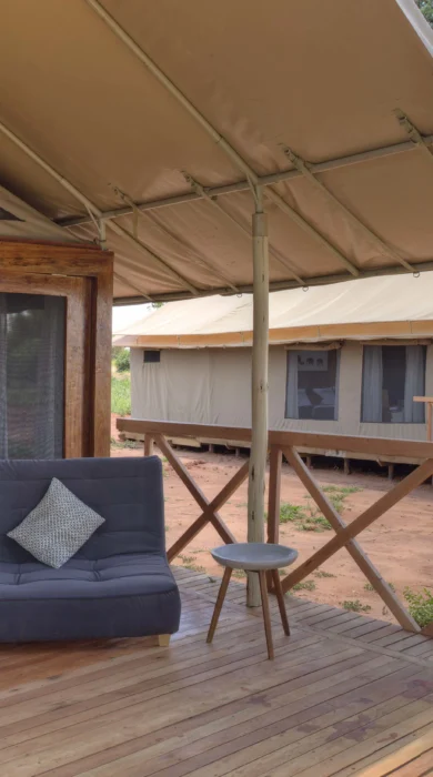 nasikia ndovu tented camp bedroom balcony tanzania yellow zebra safaris