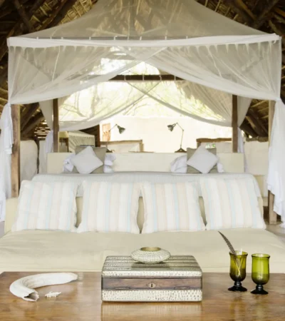 Sand Rivers Camp Selous double bed yellow zebra safaris