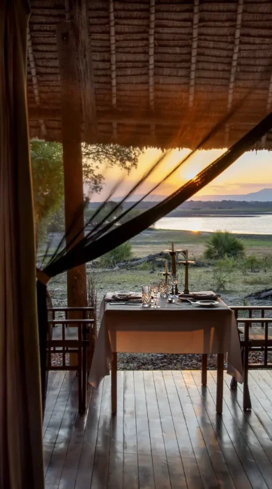 private dinner, siwandu camp, nyerere national park, tanzania