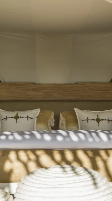 bed bedroom mwiba lodge tanzania yellow zebra safaris