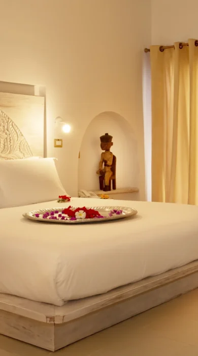 gold zanzibar villa bed tanzania yellow zebra safaris