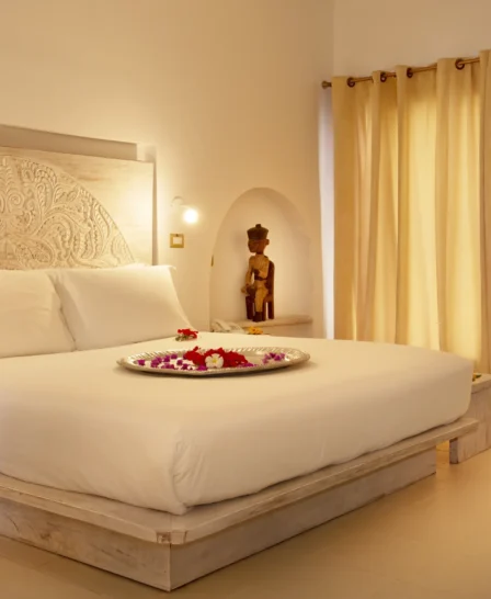 gold zanzibar villa bed tanzania yellow zebra safaris