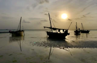 unguja lodge village boats tanzania yellow zebra safaris