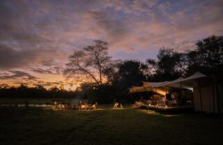 Boma fire after dark at Chicari, Gorongosa, Mozambique - Yellow Zebra Safaris