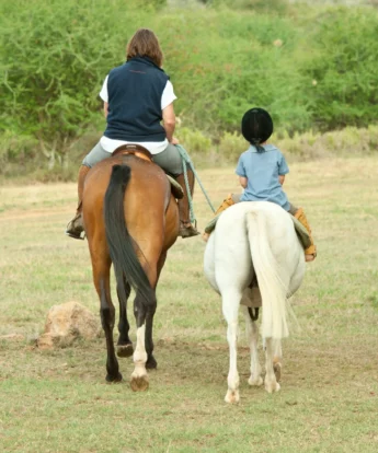 Sosian children horse riding
