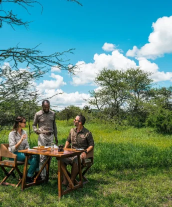 outside meals, camp fire, lemala mara, the serengeti, tanzania
