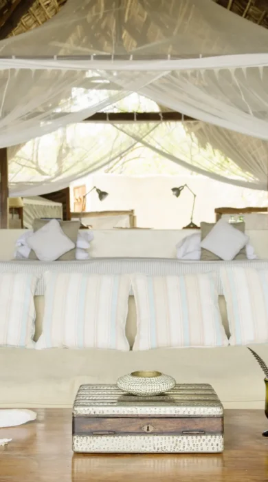 Sand Rivers Camp Selous double bed yellow zebra safaris